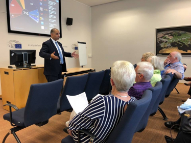 Sajjad speaking to the Cumbria Group